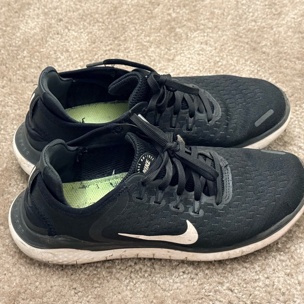 Nike Women’s Black Running Sneakers with White Swoosh and Lime Insole
